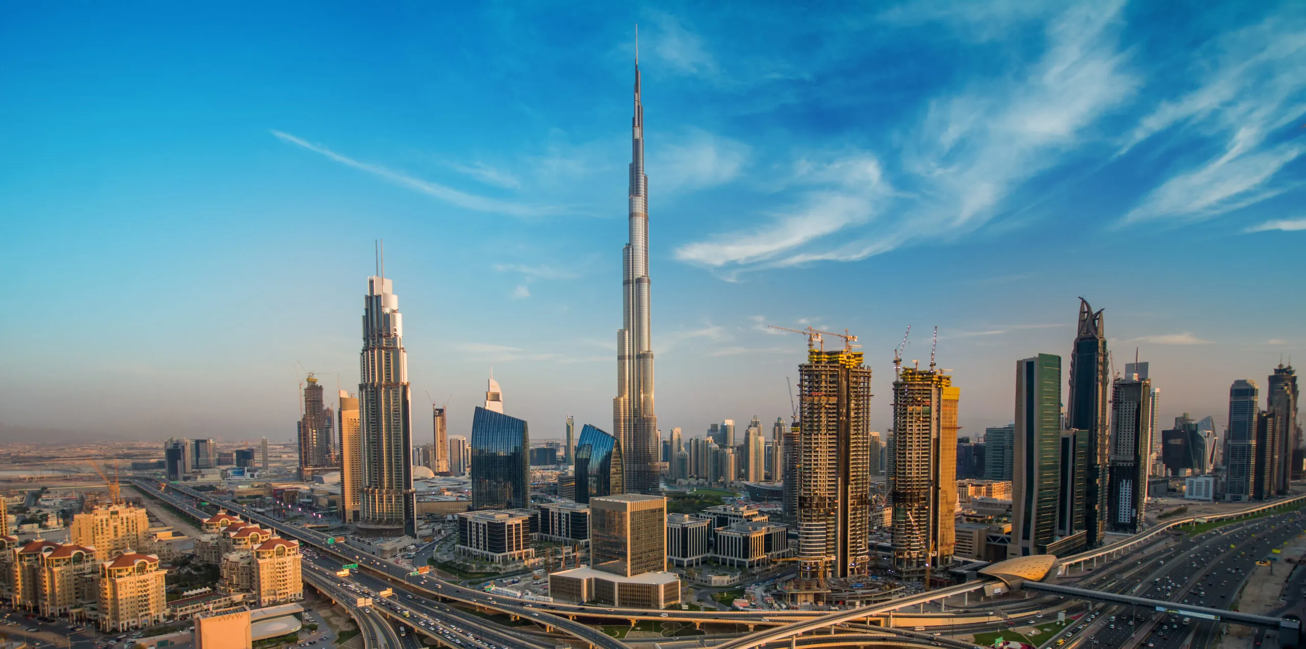 Dubai skyline with Burj Khalifa at sunset
